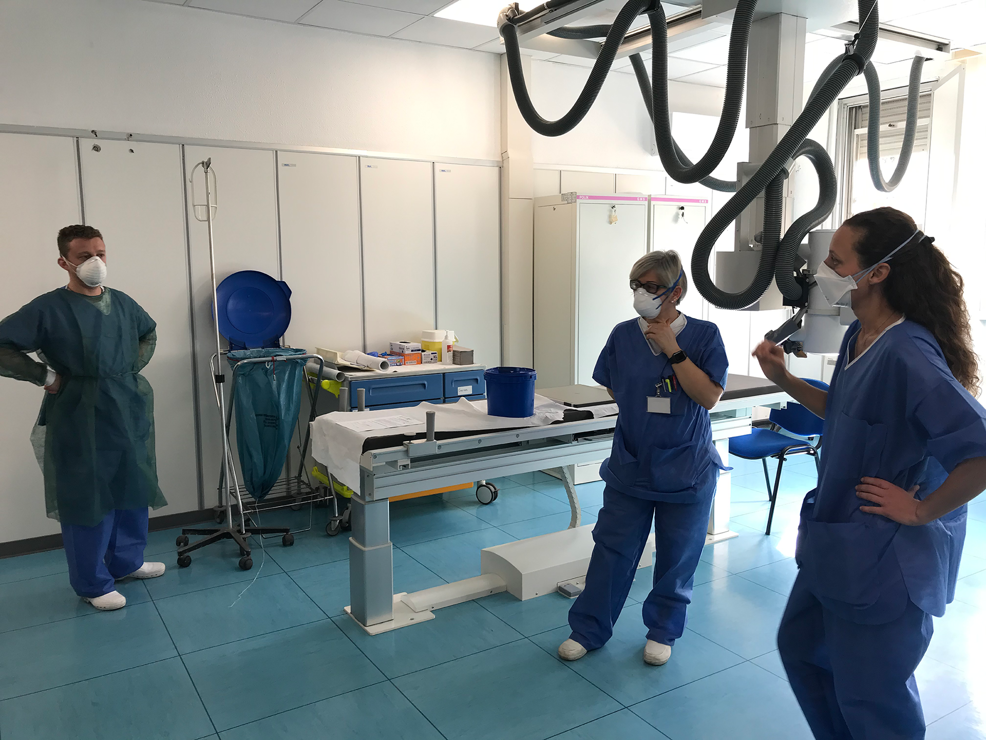 MSF project coordinator Carlotta Berutti, in collaboration with the staff of Codogno hospital in Lodi province, is securing the examination room. © Lisa Veran/MSF